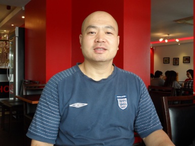 The owner of the restaurant, Qi Tao
